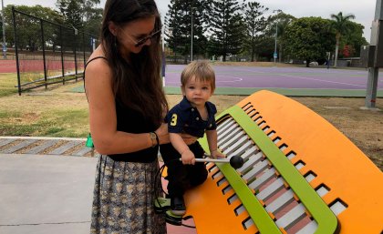 Cartier, 1, of Bowen Hills and his mum Jhulan tried out the xylophone today ahead of the fun community morning 8-10am on Saturday.